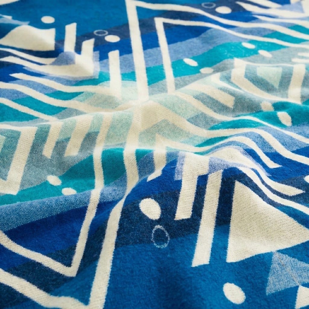 Close-up of a blue and white patterned alpaca fabric